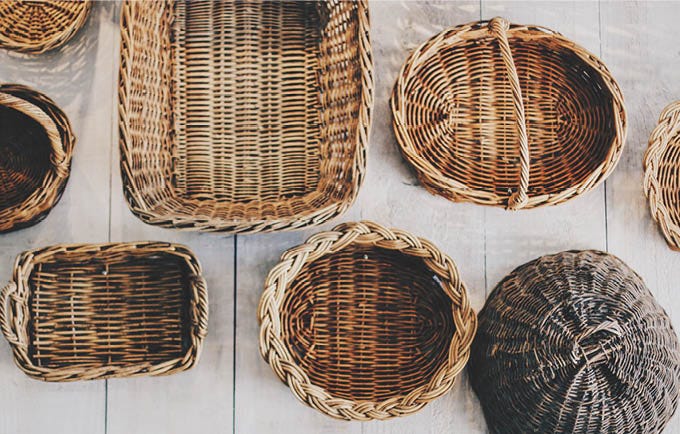 Variety of different sized wicker baskets.
